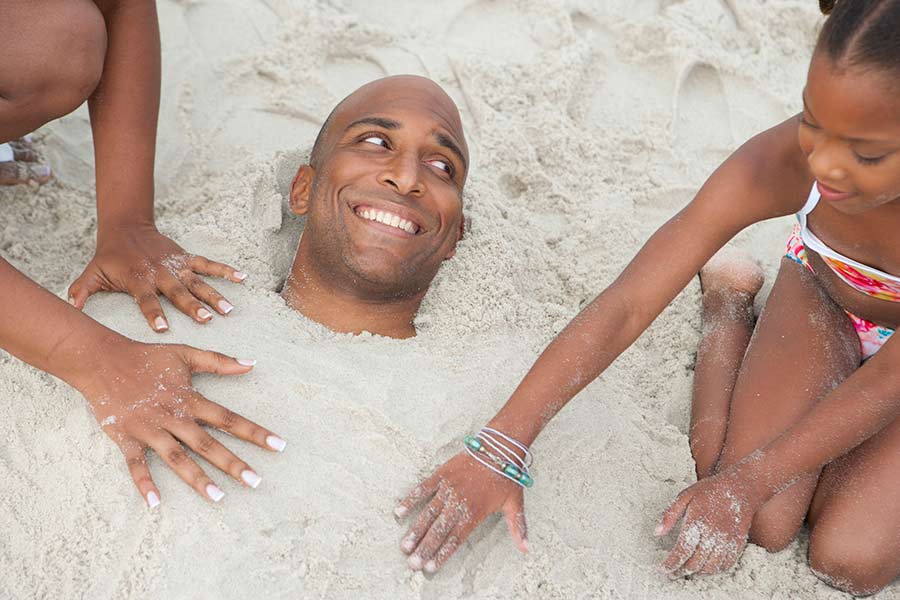 burying dad in sand