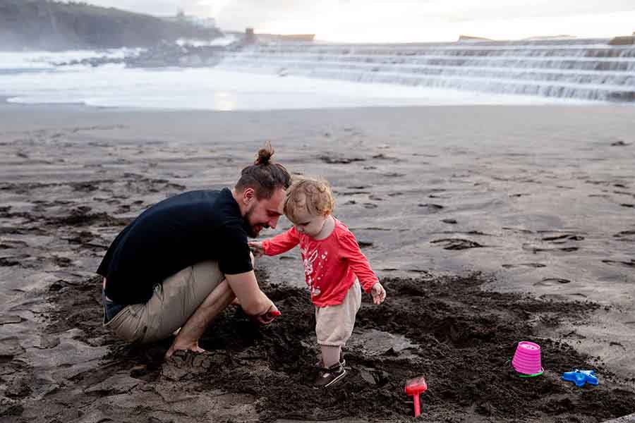 Father-Daughter playing at beach