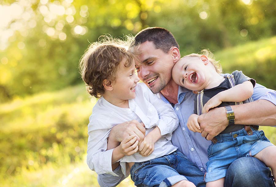 Dad and sons having fun