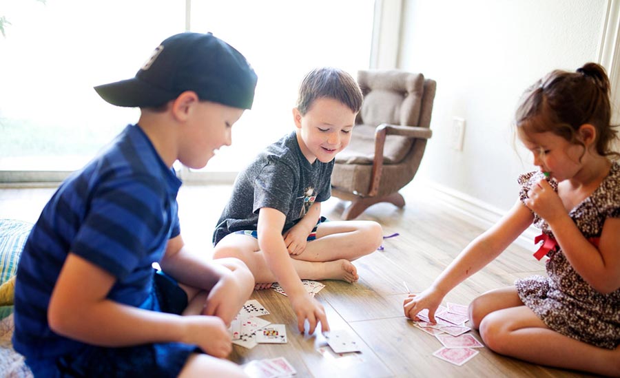 playing a card game indoors