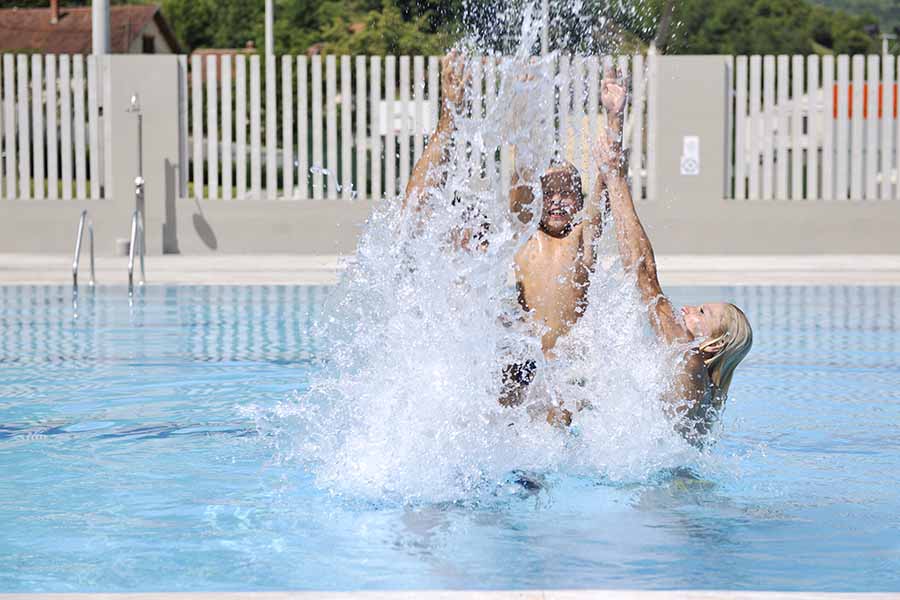 dad and son swimming