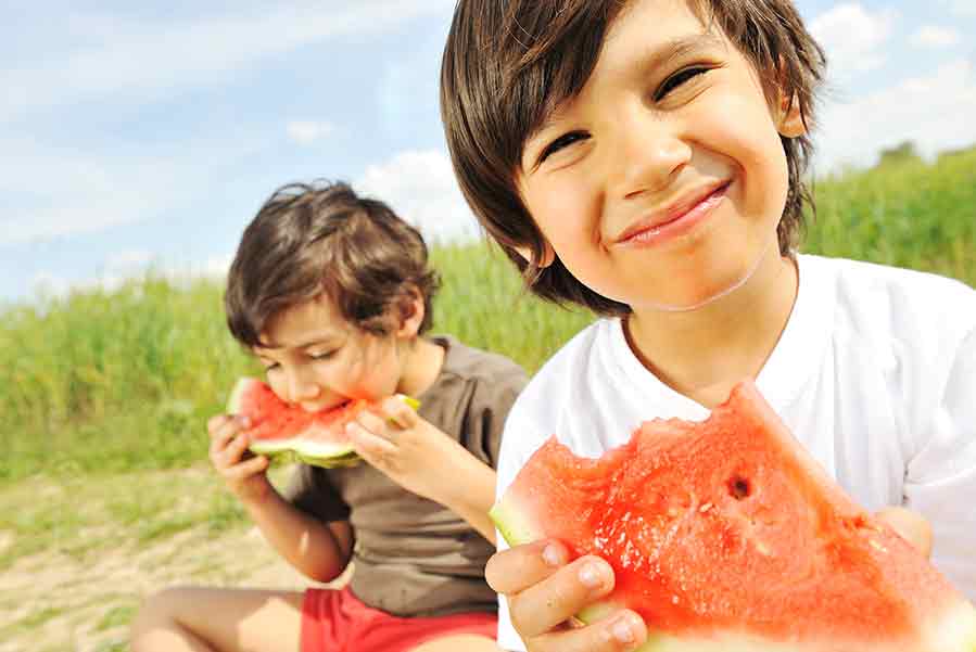 kids with snacks fishing